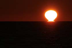 Refraction phenomeon when the sun sets  - Gabriel Pitras